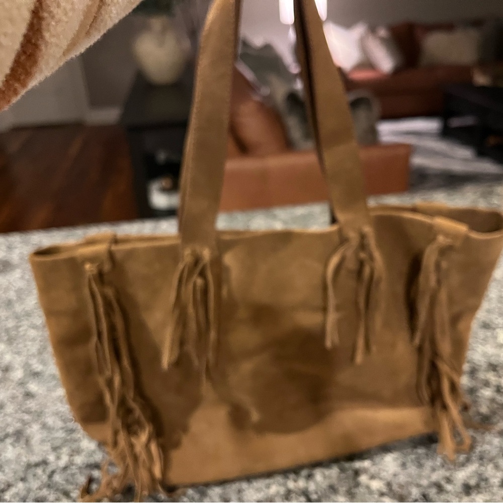 UGG new wit out tags brown fringe purse